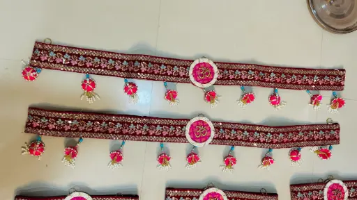 ReversibleHandcrafted Traditional Toran with Mini Umbrella Hangings & Om Design